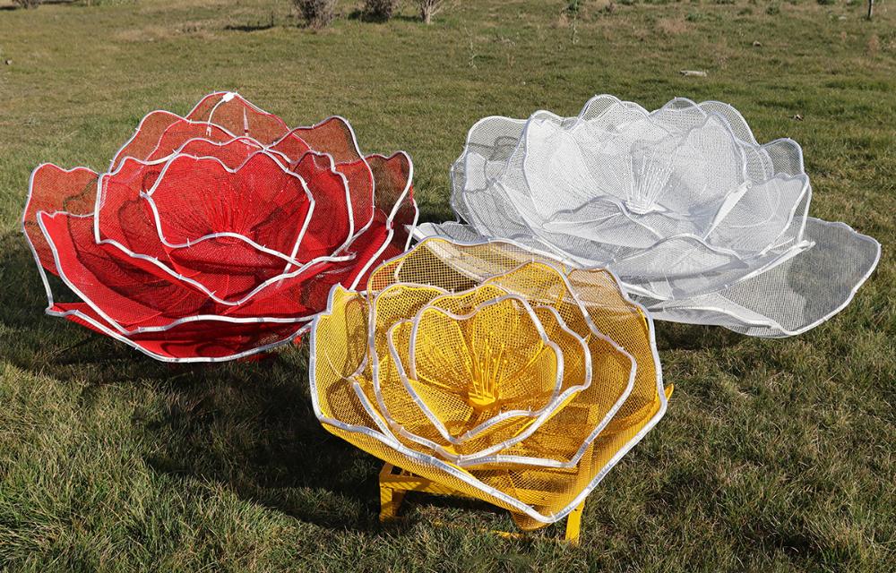 The stainless steel hollow flower sculptures