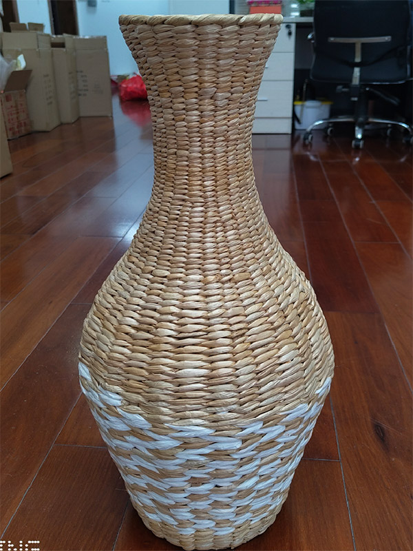 The hourglass woven flower arrangement vase