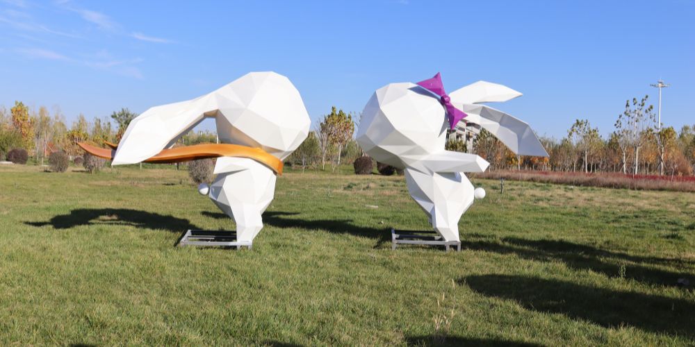 The standing white geometric rabbit sculpture