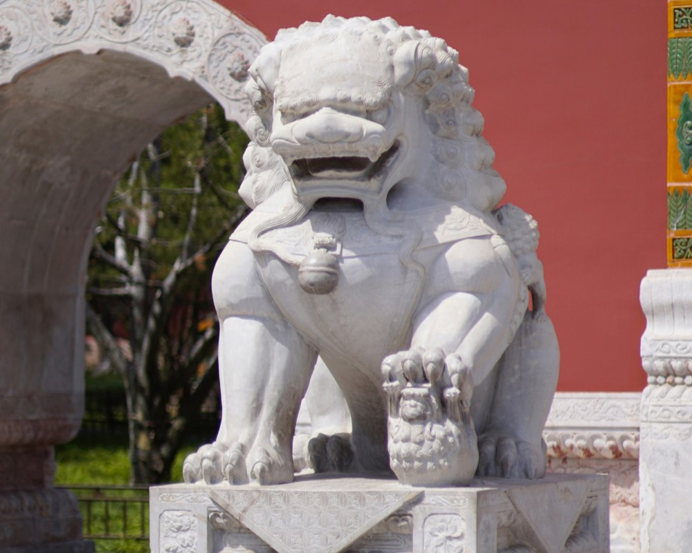 Lion sculpture at the entrance of house