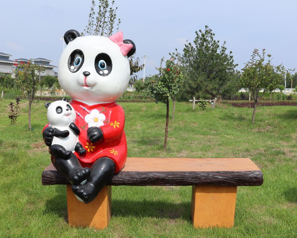 Paesaggio in fibra di vetro seduta statue di cartone animato Scultura animale con statua del sedile da banco in vendita