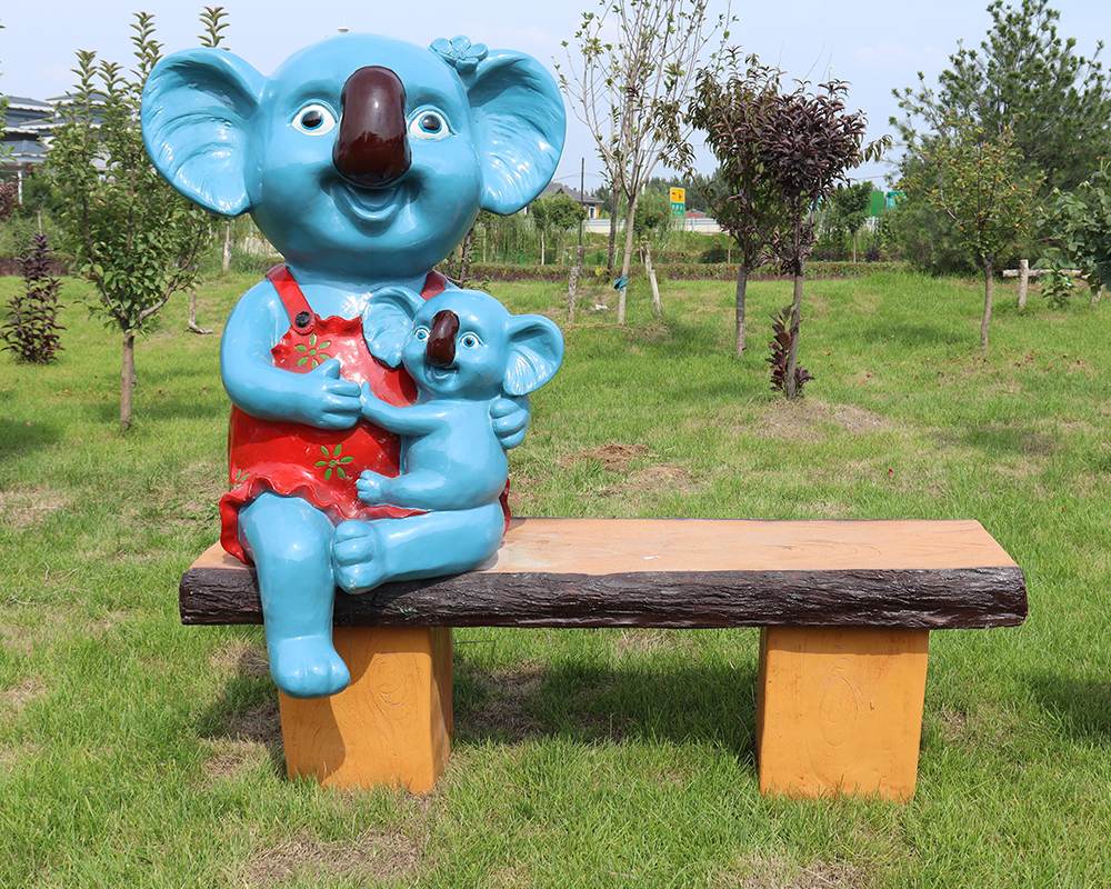Paesaggio in fibra di vetro seduta statue di cartone animato Scultura animale con statua del sedile da banco in vendita