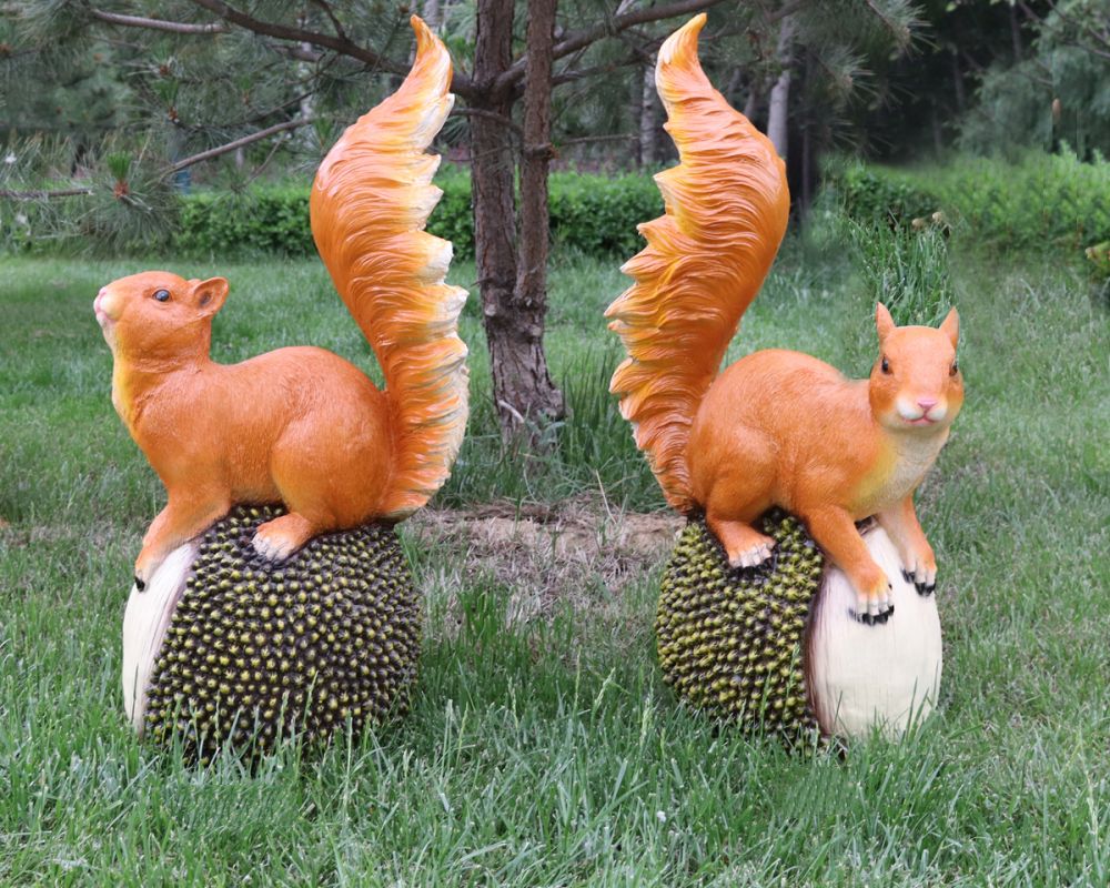 Custom squirrel statues are placed outdoors
